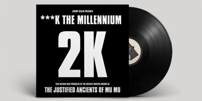 Black sleeve with white text, announcing "Jeremy Deller presents Fuck The Millennium", followed by large 2K logo and note that "This record was produced by the artists forever known as The Justified Ancients Of Mu Mu"