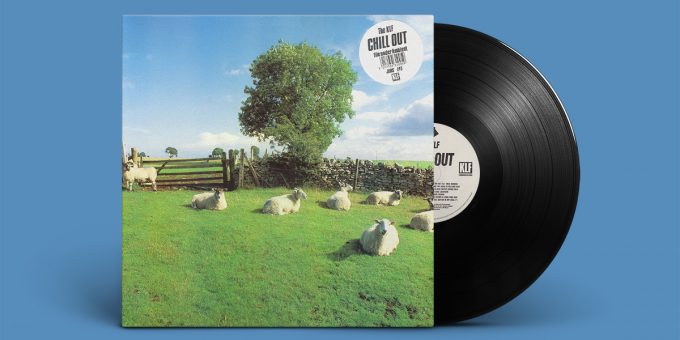 Cover of "Chill Out" by The KLF; sheep in countryside; featuring white sticker with album name and "file under ambient" notice